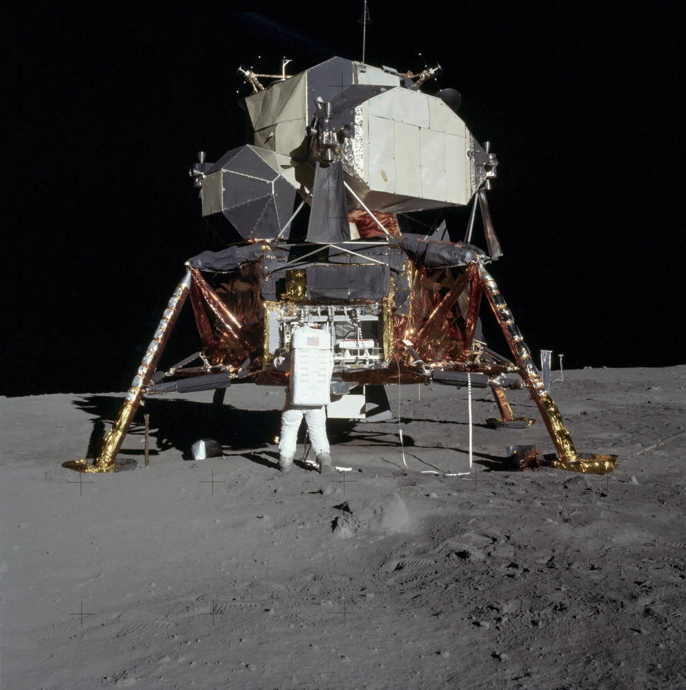 An Apollo 11 astronaut in front of the lunar module Canvas Art - Stocktrek Images (28 x 29)