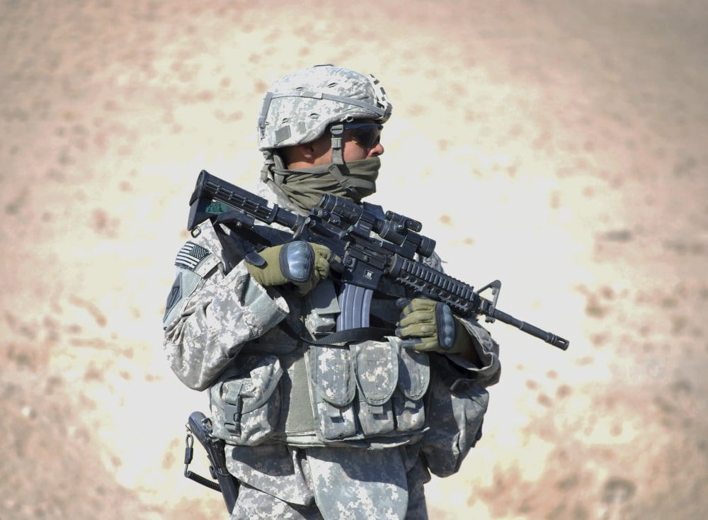 An Army soldier stands guard while near Qalat Afghanistan Canvas Art - Stocktrek Images (33 x 24)