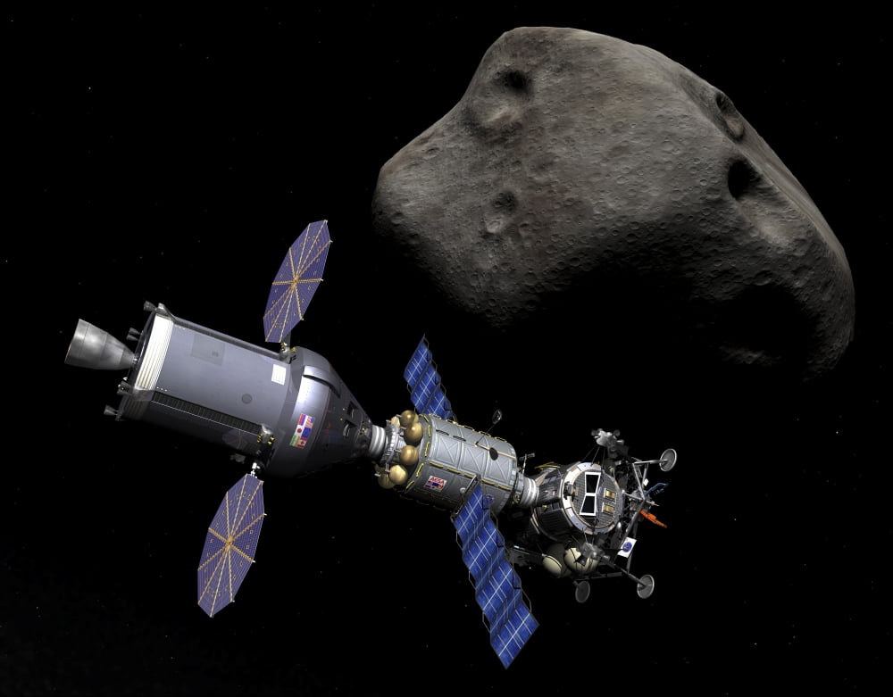 An Asteroid Lander is docked to a Deep Space Vehicle Canvas Art - Walter MyersStocktrek Images (33 x 26)