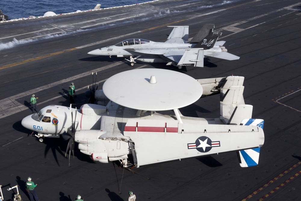 An E-2C Hawkey and an FA-18 Super Hornet aboard USS Dwight D Eisenhower Canvas Art - Gert KromhoutStocktrek Images (18 x 12)