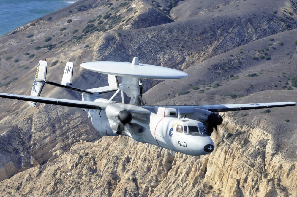 An E-2C Hawkeye aircraft flies over the Pacific Ocean Canvas Art - Stocktrek Images (35 x 23)