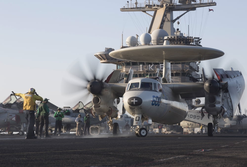 An E-2C Hawkeye during flight operations on USS Dwight D Eisenhower Canvas Art - Gert KromhoutStocktrek Images (17 x 12)