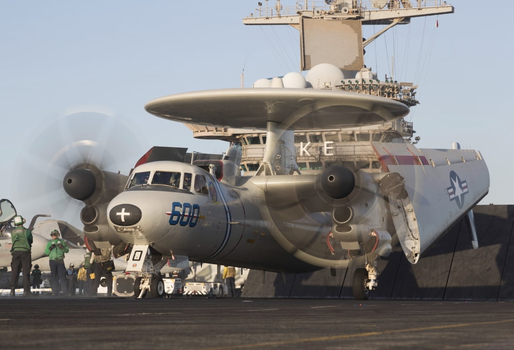 An E-2C Hawkeye during flight operations on USS Dwight D Eisenhower Canvas Art - Gert KromhoutStocktrek Images (18 x 12)