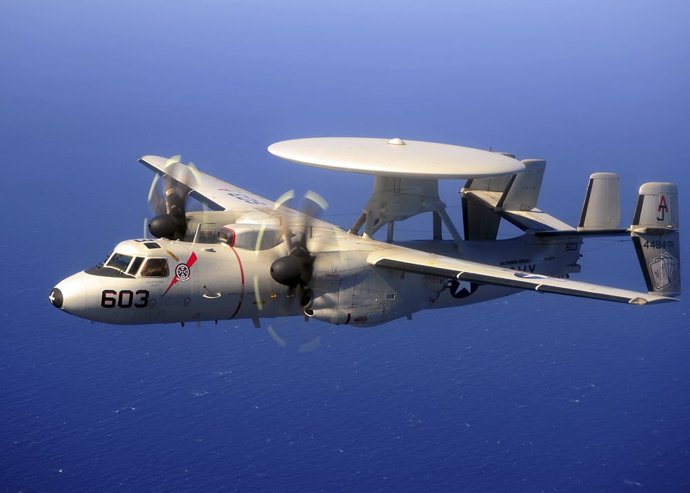An E-2C Hawkeye flying over the Pacific Ocean Canvas Art - Stocktrek Images (34 x 24)