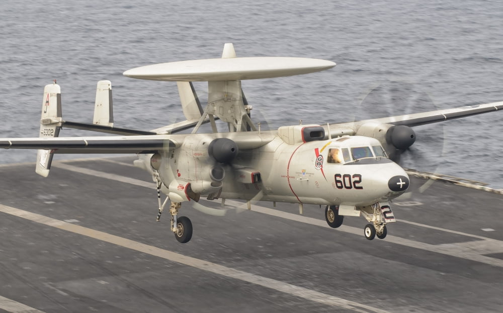 An E-2C Hawkeye landing on the flight deck of USS George HW Bush Canvas Art - Giovanni CollaStocktrek Images (18 x 11)