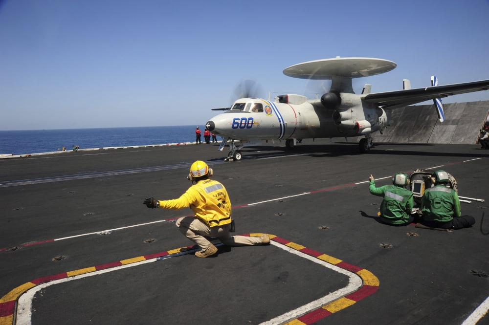 An E-2C Hawkeye launches from the flight deck of USS Dwight D Eisenhower Canvas Art - Stocktrek Images (35 x 23)