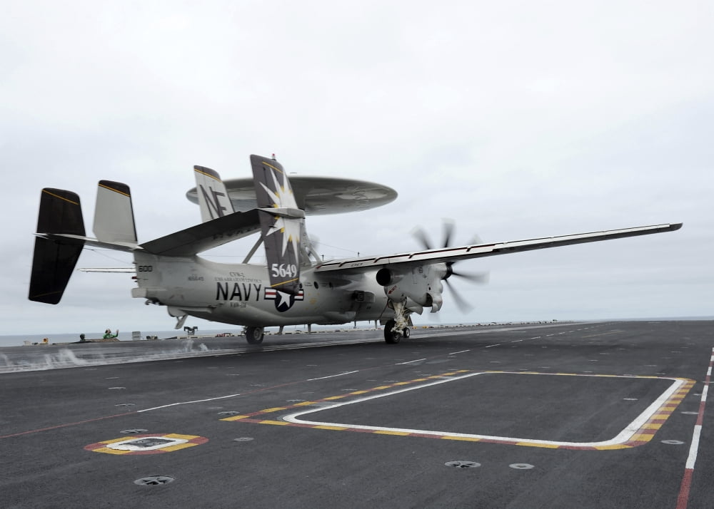 An E-2C Hawkeye launches off the flight deck of USS Abraham Lincoln Canvas Art - Stocktrek Images (33 x 24)