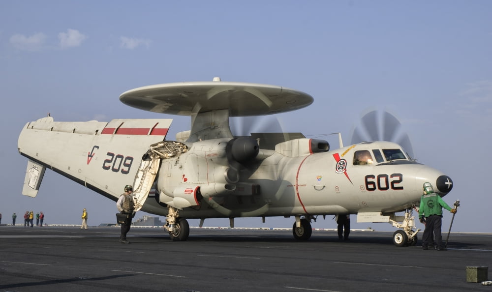 An E-2C Hawkeye ready to launch from the deck of USS George HW Bush Canvas Art - Giovanni CollaStocktrek Images (18 x 11)