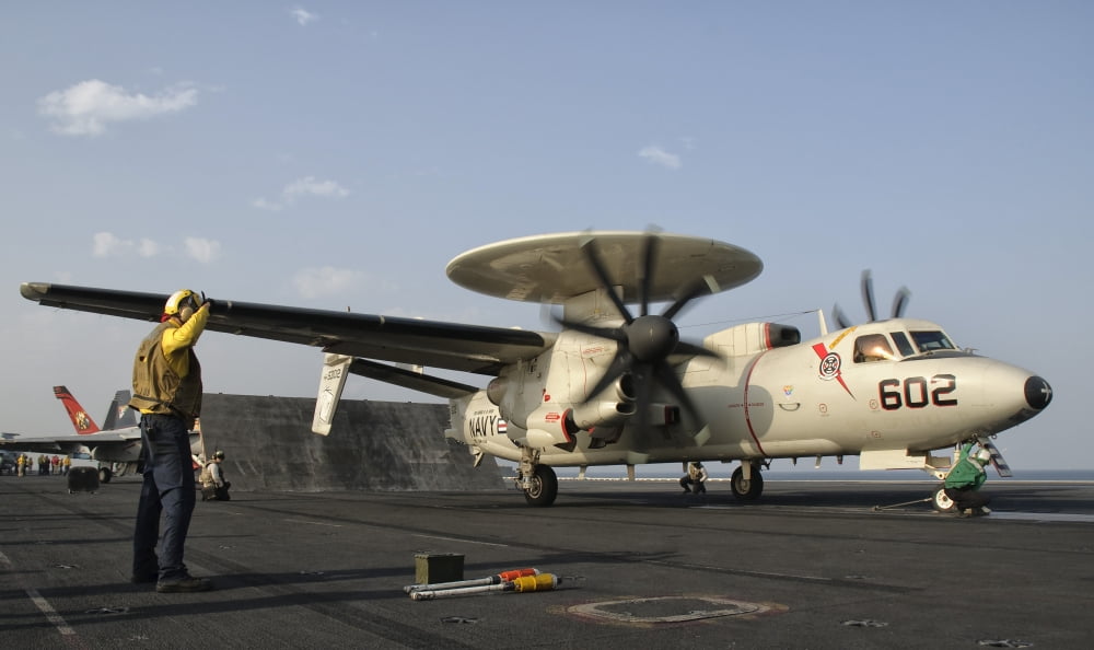 An E-2C Hawkeye ready to launch from the deck of USS George HW Bush Canvas Art - Giovanni CollaStocktrek Images (36 x 22)