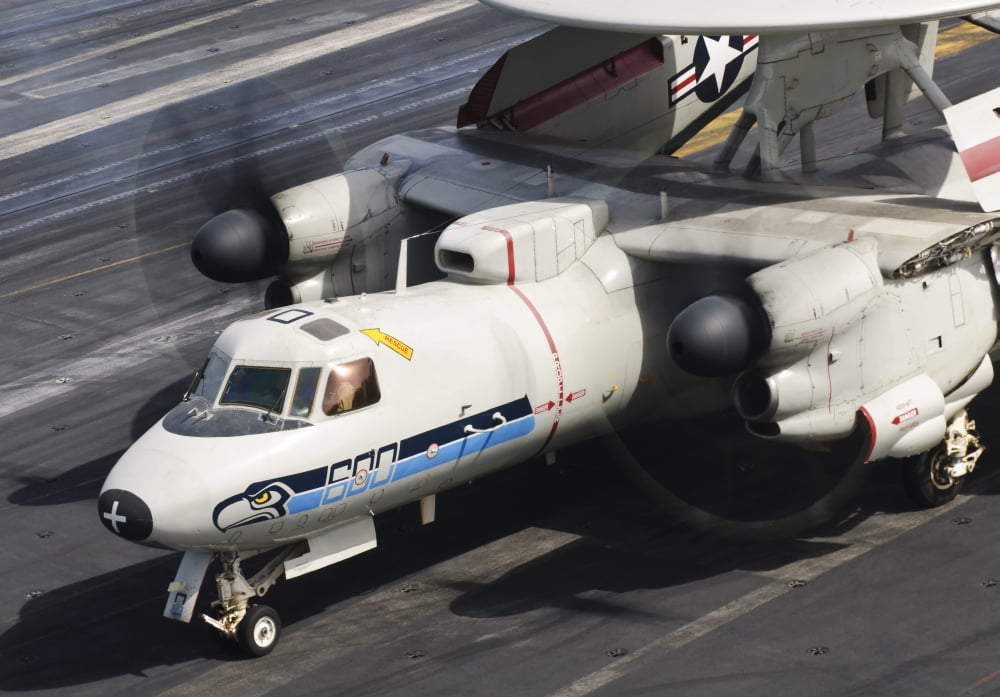 An E-2C Hawkeye sits ready aboard USS Harry S Truman Canvas Art - Giovanni CollaStocktrek Images (17 x 12)