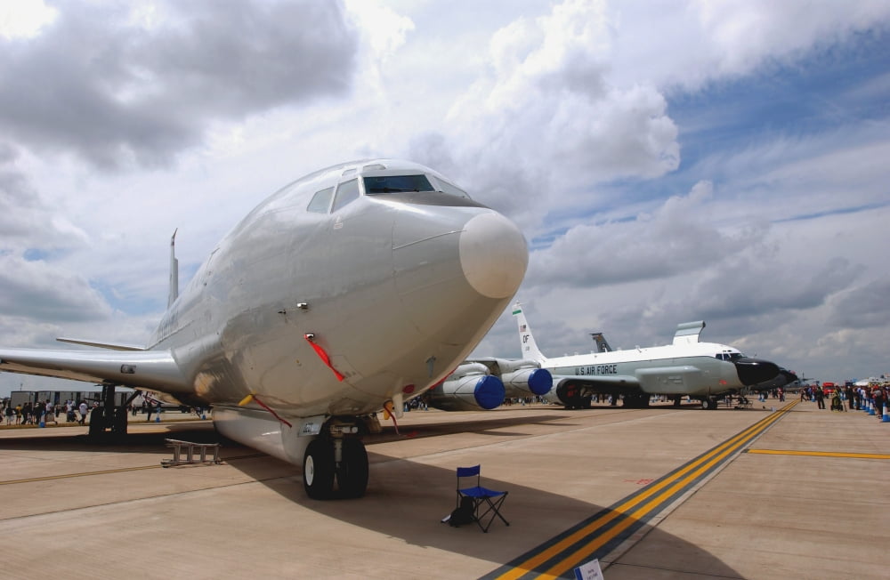 An E-8C Joint Surveillance Target Attack Radar System (Joint STARS) and a RC-135VW Rivet Joint aircraft Canvas Art - Stocktrek Images (34 x 23)