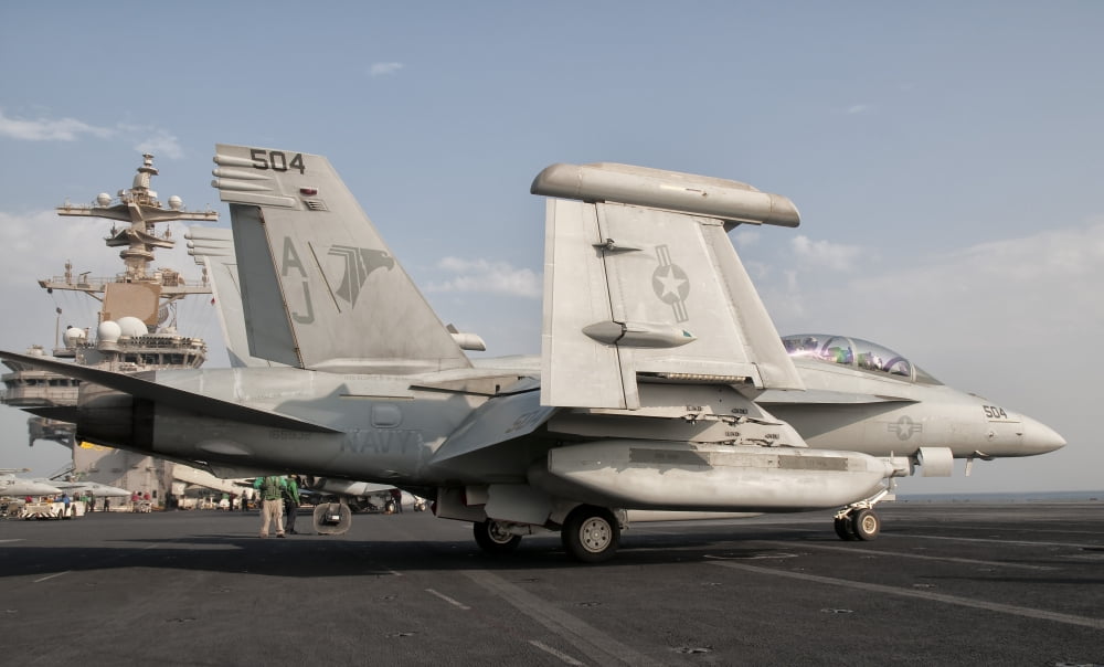 An EA-18G Growler aboard USS George HW Bush Canvas Art - Giovanni CollaStocktrek Images (18 x 11)