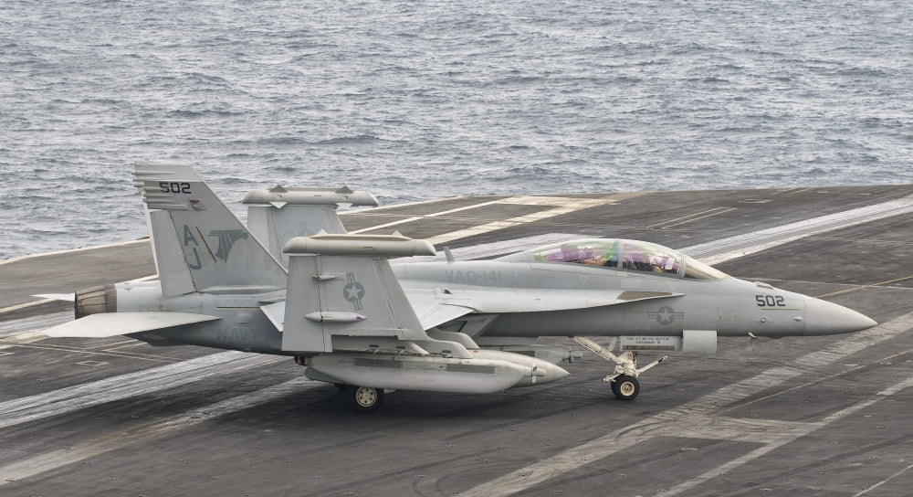 An EA-18G Growler aboard USS George HW Bush Canvas Art - Giovanni CollaStocktrek Images (19 x 11)
