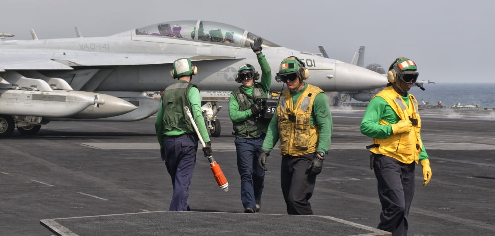 An EA-18G Growler is guided into catapult aboard USS George HW Bush Canvas Art - Giovanni CollaStocktrek Images (20 x 10)