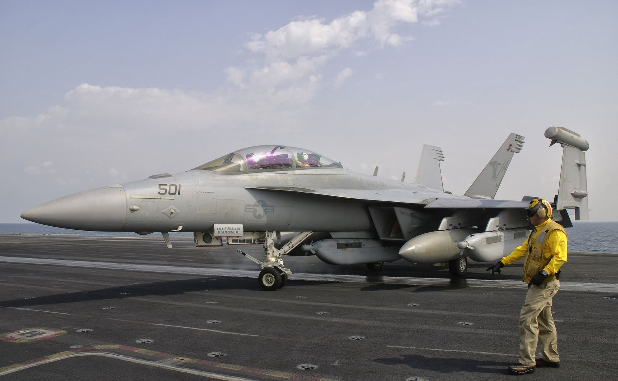 An EA-18G Growler is guided into catapult aboard USS George HW Bush Canvas Art - Giovanni CollaStocktrek Images (36 x 23)