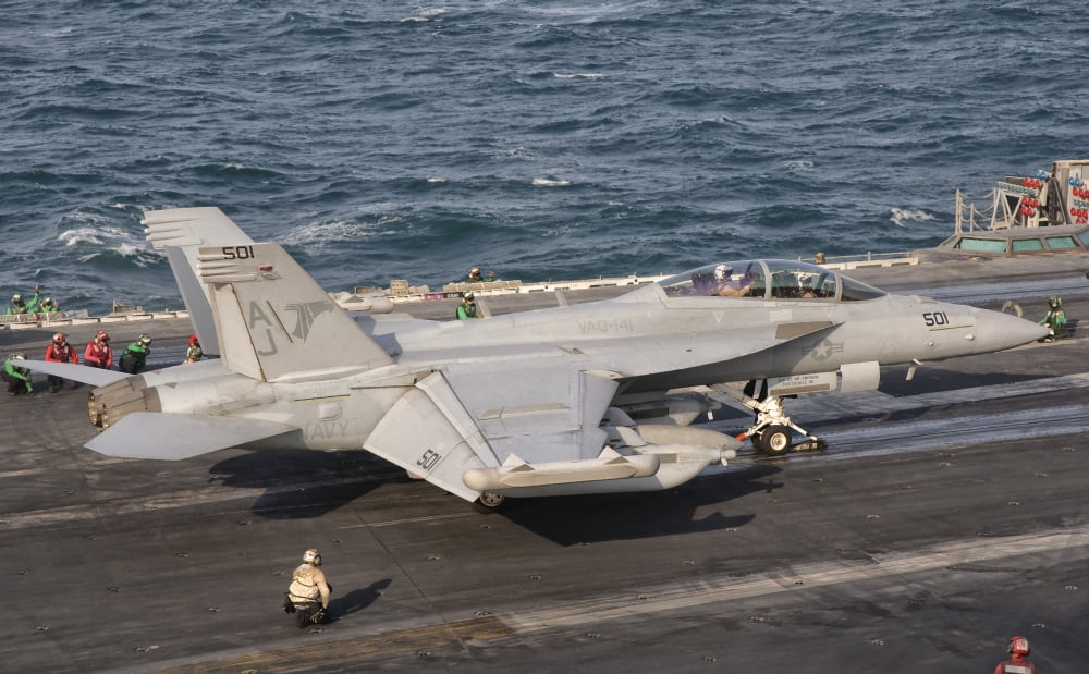 An EA-18G Growler is ready for a mission aboard USS George HW Bush Canvas Art - Giovanni CollaStocktrek Images (18 x 12)