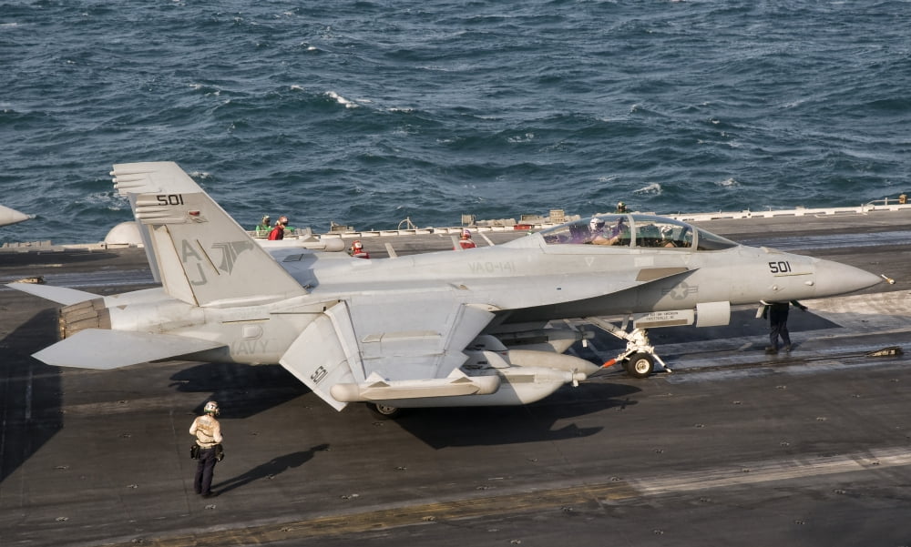 An EA-18G Growler is ready for a mission aboard USS George HW Bush Canvas Art - Giovanni CollaStocktrek Images (36 x 22)