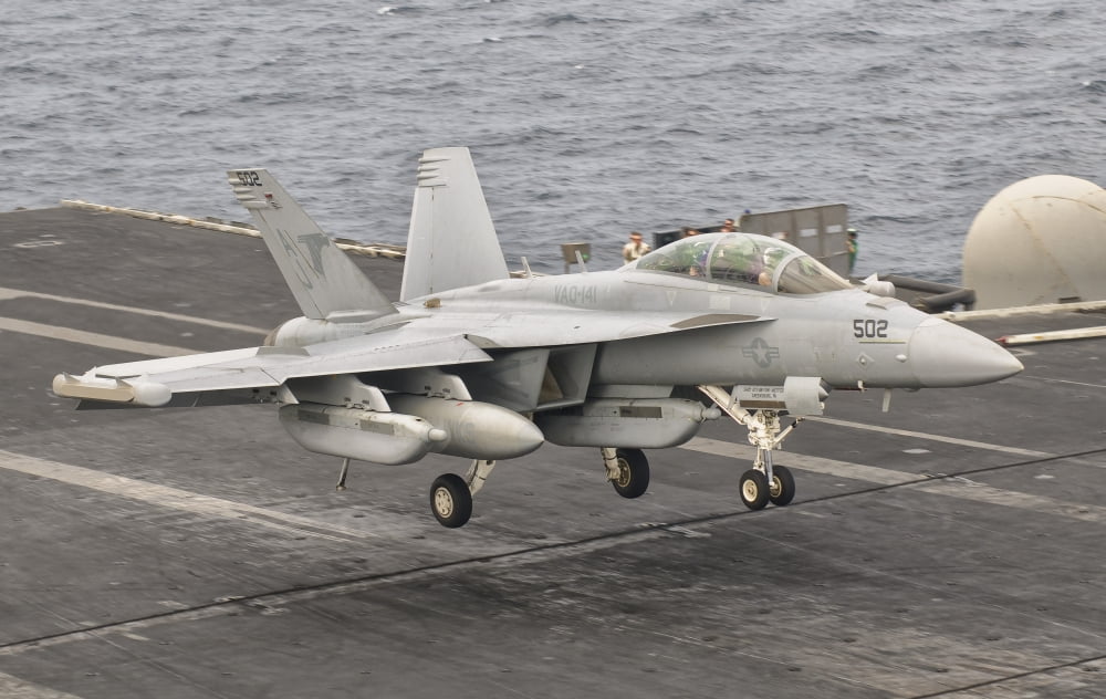 An EA-18G Growler landing on the flight deck of USS George HW Bush Canvas Art - Giovanni CollaStocktrek Images (18 x 11)