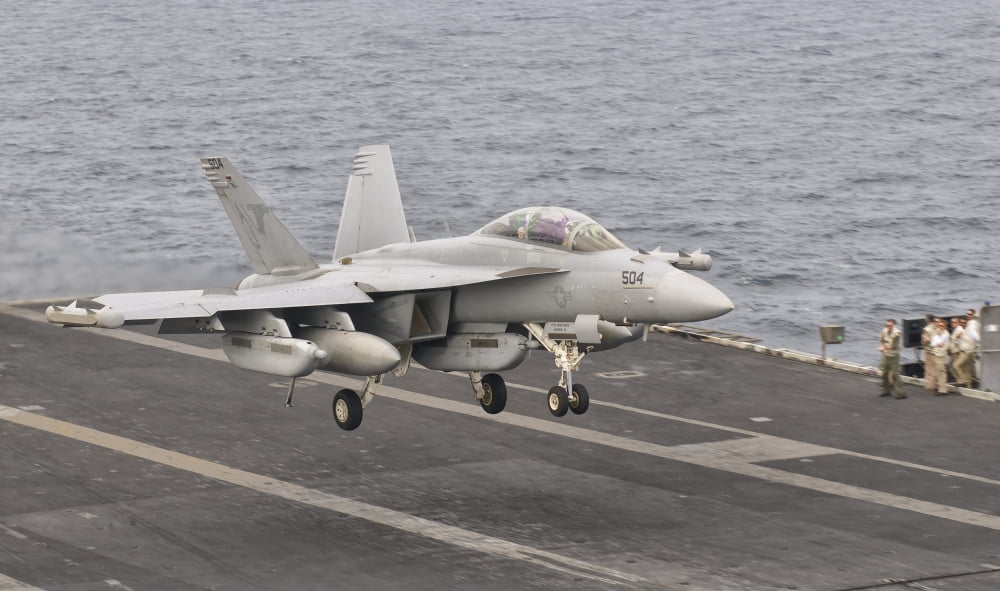 An EA-18G Growler landing on the flight deck of USS George HW Bush Canvas Art - Giovanni CollaStocktrek Images (36 x 22)