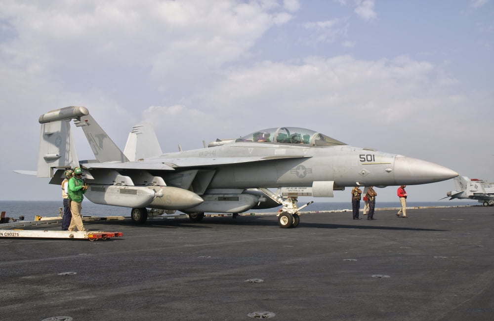 An EA-18G Growler ready for a mission aboard USS George HW Bush Canvas Art - Giovanni CollaStocktrek Images (18 x 12)