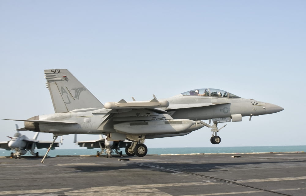 An EA-18G Growler trap landing on the flight deck of USS George HW Bush Canvas Art - Giovanni CollaStocktrek Images (35 x 23)