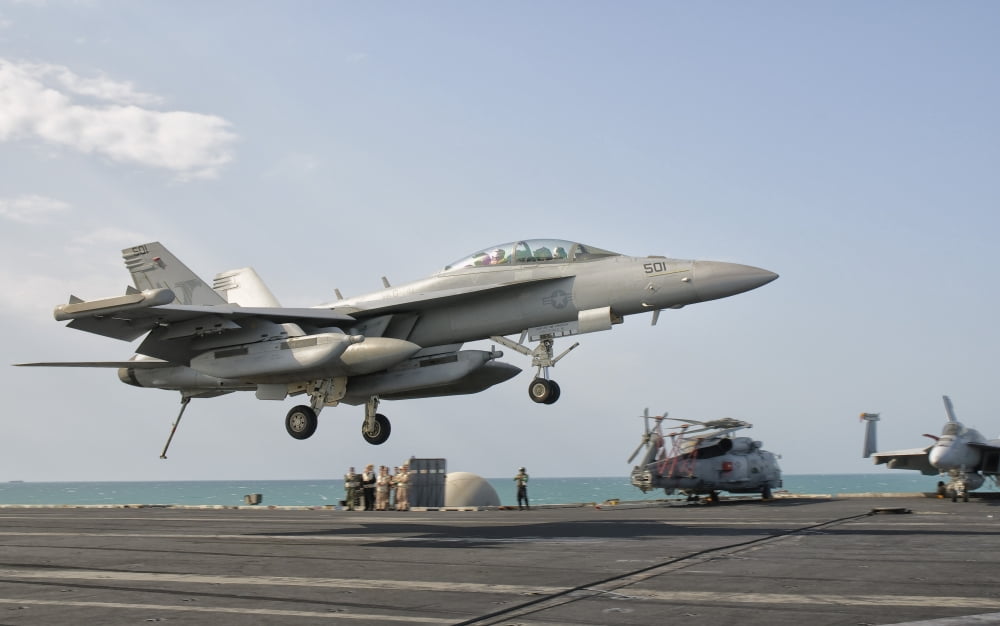 An EA-18G Growler trap landing on the flight deck of USS George HW Bush Canvas Art - Giovanni CollaStocktrek Images (36 x 22)