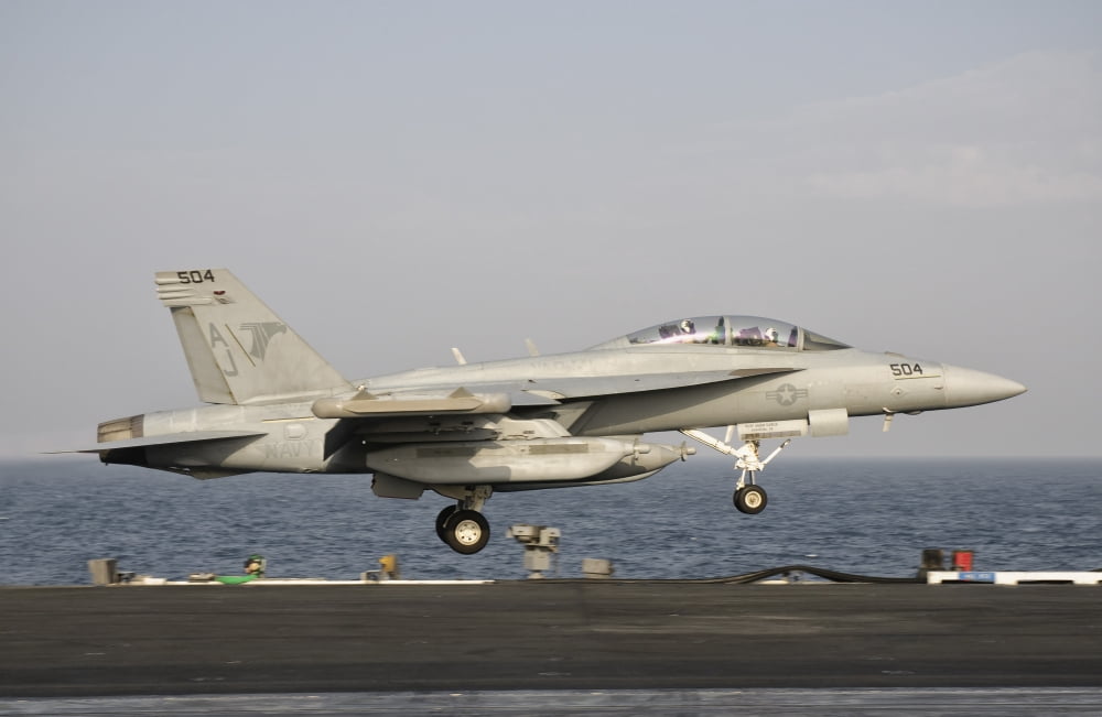 An EA-18G taking off from the flight deck of USS George HW Bush Canvas Art - Giovanni CollaStocktrek Images (18 x 12)