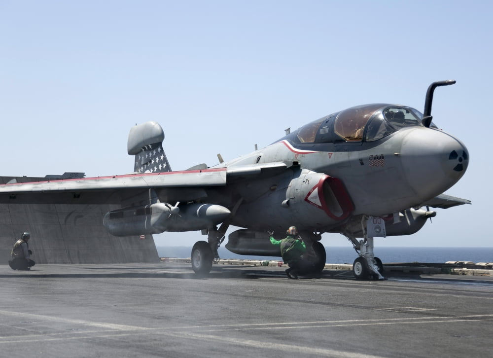 An EA-6B Prowler during flight operations on USS Dwight D Eisenhower Canvas Art - Gert KromhoutStocktrek Images (17 x 12)