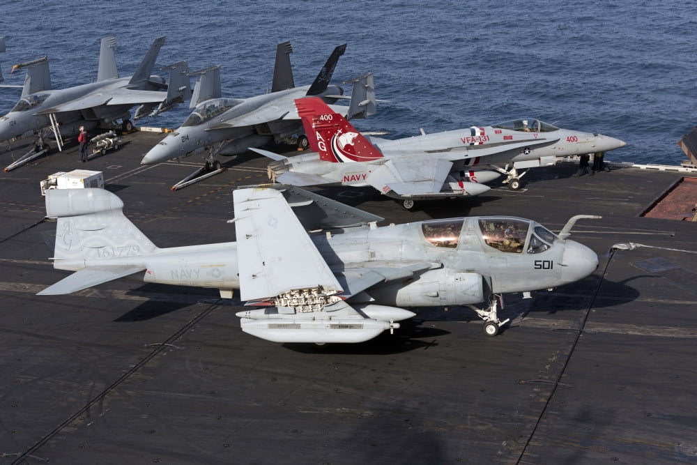 An EA-6B Prowler during flight operations on USS Dwight D Eisenhower Canvas Art - Gert KromhoutStocktrek Images (18 x 12)