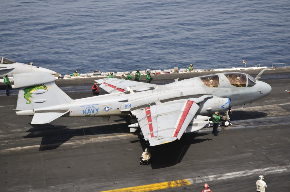 An EA-6B Prowler is ready to go from the flight deck of USS Harry S Truman Canvas Art - Giovanni CollaStocktrek Images (35 x 23)