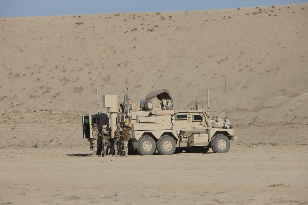 An EOD Cougar MRAP in a wadi near Kunduz Afghanistan Canvas Art - Terry MooreStocktrek Images (35 x 24)