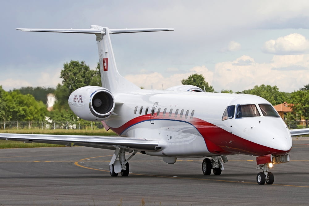 An Embraer Legacy 600 private jet taxiing at Turin Airport Italy Canvas Art - Luca NicolottiStocktrek Images (35 x 23)