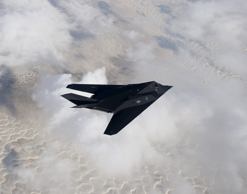 An F-117 Nighthawk stealth fighter in flight over New Mexico Canvas Art - HIGH-G ProductionsStocktrek Images (16 x 13)