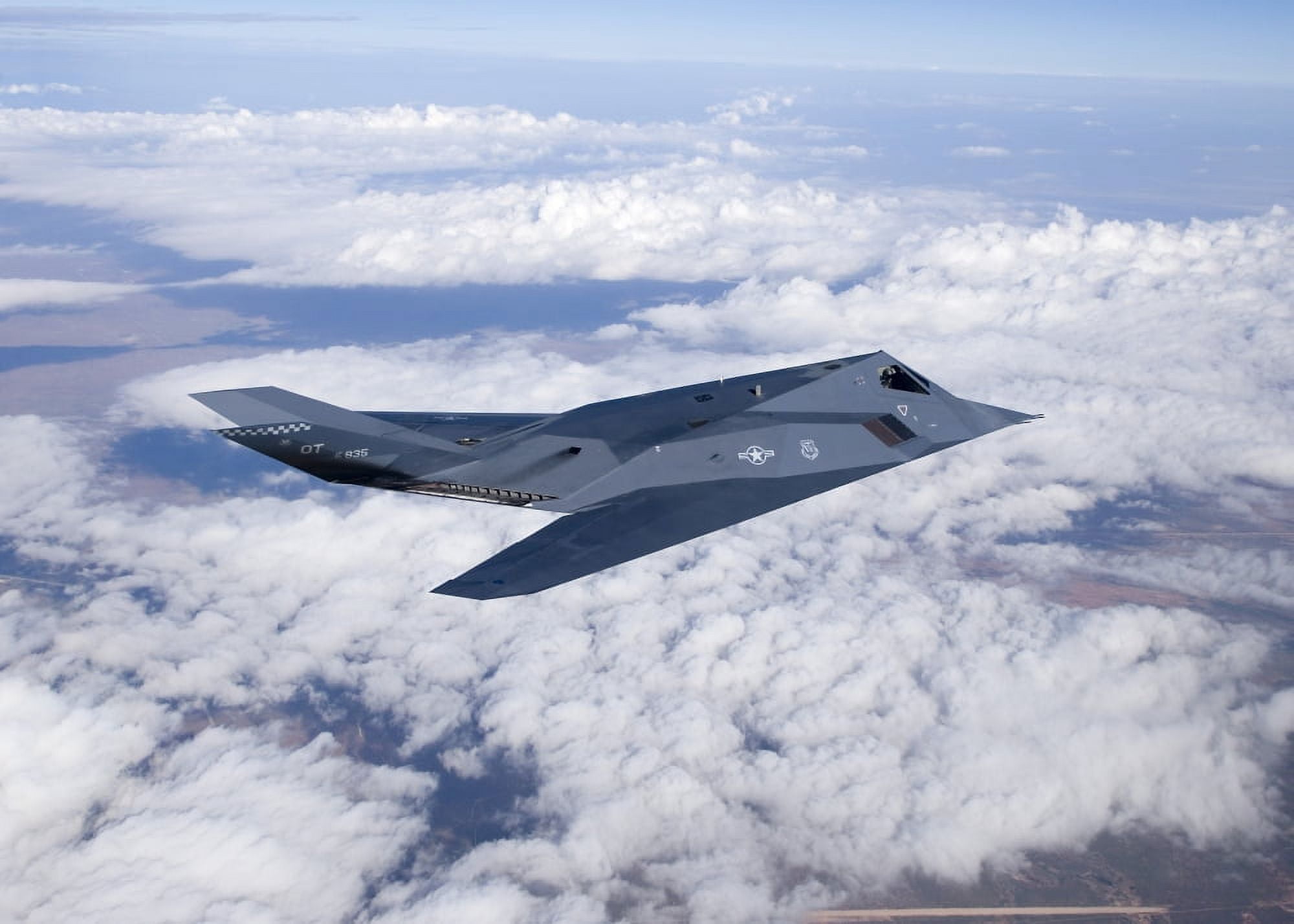 An F-117 Nighthawk stealth fighter in flight over New Mexico Canvas Art - HIGH-G ProductionsStocktrek Images (17 x 13)