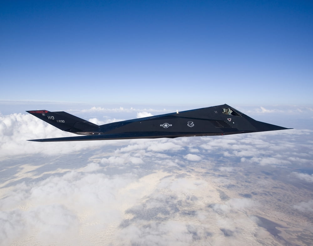 An F-117 Nighthawk stealth fighter in flight over New Mexico Canvas Art - HIGH-G ProductionsStocktrek Images (33 x 26)