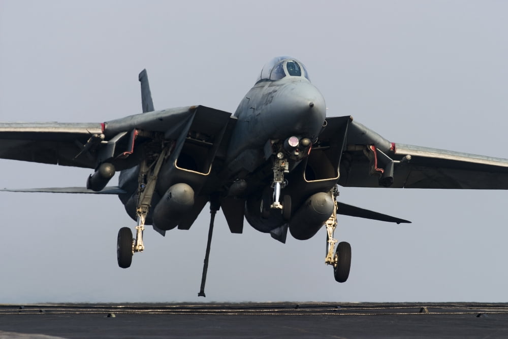 An F-14D Tomcat comes in for an arrested landing on the flight deck of USS Theodore Roosevelt Canvas Art - Gert KromhoutStocktrek Images (35 x 23)