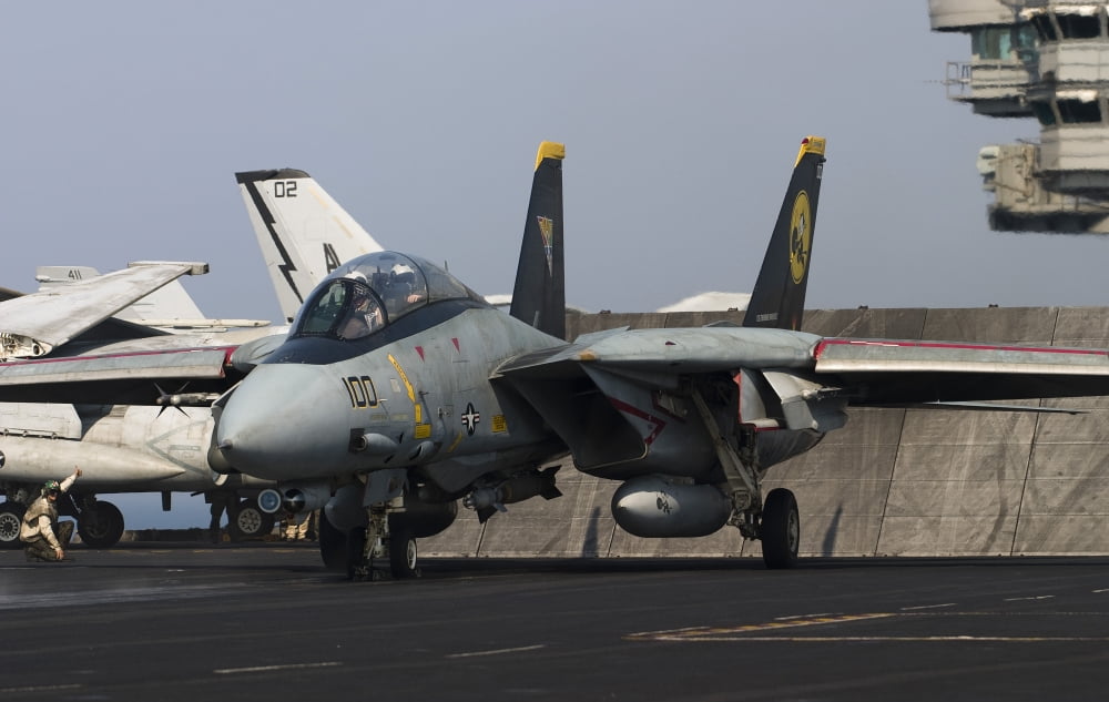 An F-14D Tomcat in launch position on the flight deck of USS Theodore Roosevelt Canvas Art - Gert KromhoutStocktrek Images (18 x 12)