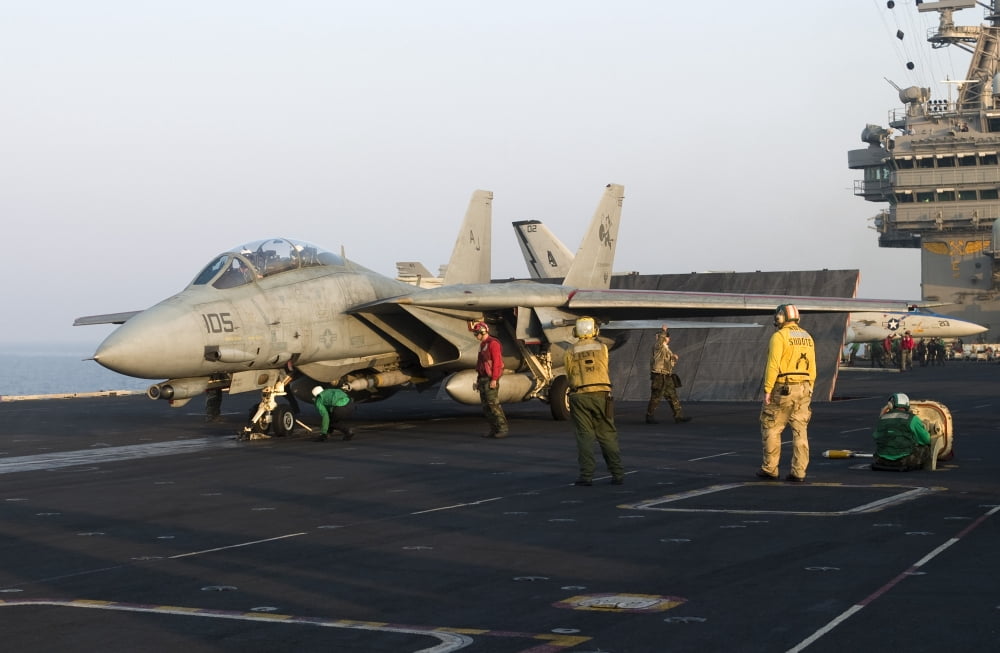 An F-14D Tomcat in launch position on the flight deck of USS Theodore Roosevelt Canvas Art - Gert KromhoutStocktrek Images (35 x 23)