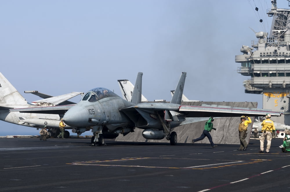 An F-14D Tomcat in launch position on the flight deck of USS Theodore Roosevelt Canvas Art - Gert KromhoutStocktrek Images (35 x 23)