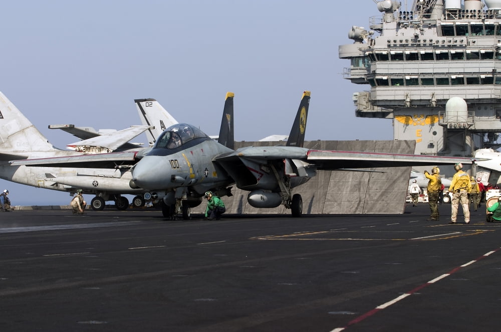 An F-14D Tomcat in launch position on the flight deck of USS Theodore Roosevelt Canvas Art - Gert KromhoutStocktrek Images (35 x 23)