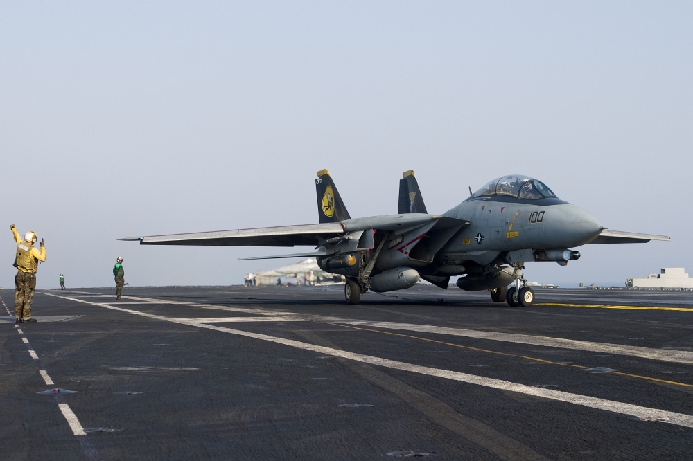 An F-14D Tomcat on the flight deck of USS Theodore Roosevelt Canvas Art - Gert KromhoutStocktrek Images (18 x 12)