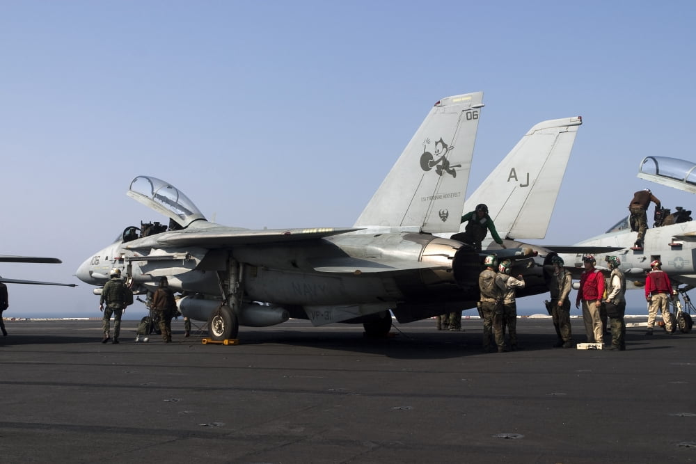 An F-14D Tomcat on the flight deck of USS Theodore Roosevelt Canvas Art - Gert KromhoutStocktrek Images (18 x 12)
