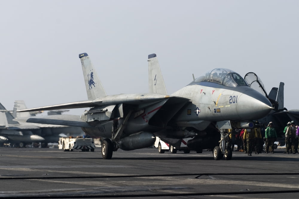 An F-14D Tomcat on the flight deck of USS Theodore Roosevelt Canvas Art - Gert KromhoutStocktrek Images (18 x 12)