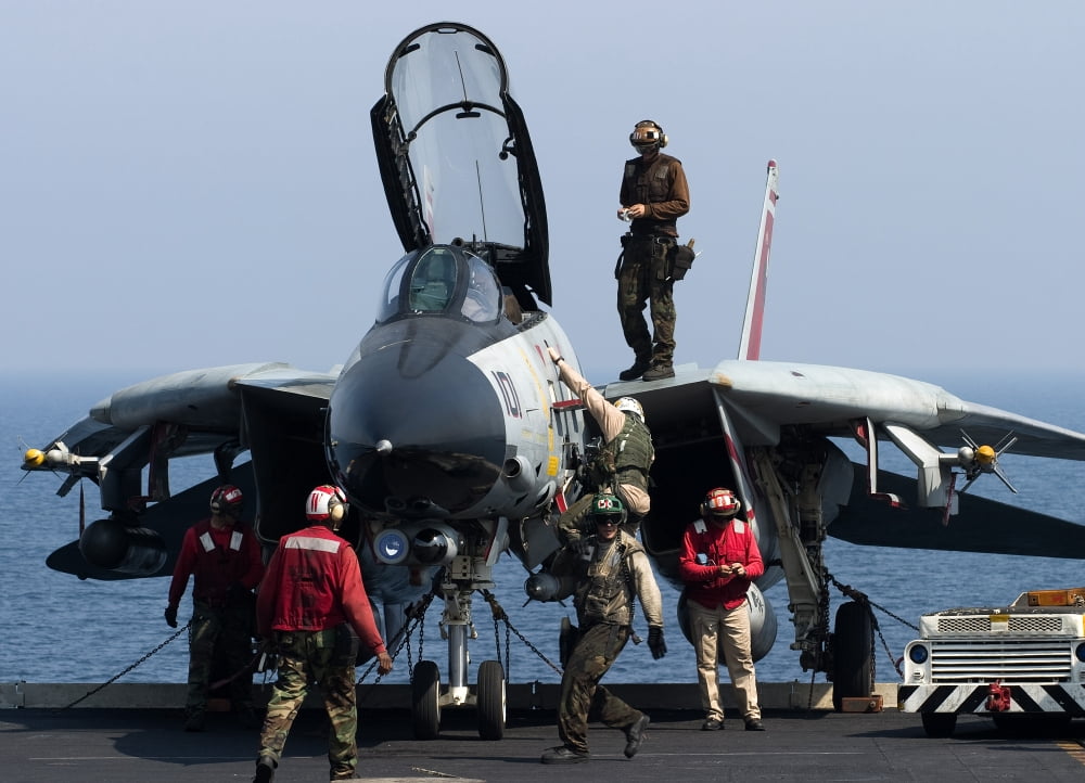 An F-14D Tomcat on the flight deck of USS Theodore Roosevelt Canvas Art - Gert KromhoutStocktrek Images (34 x 24)