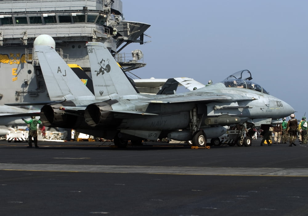 An F-14D Tomcat on the flight deck of USS Theodore Roosevelt Canvas Art - Gert KromhoutStocktrek Images (34 x 24)