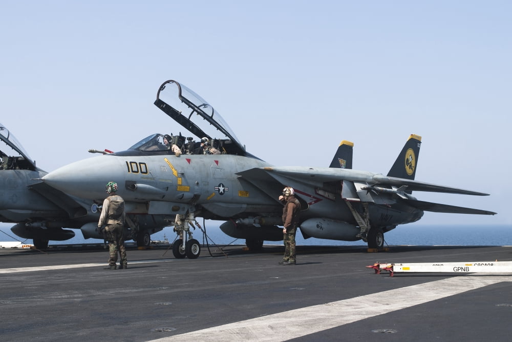 An F-14D Tomcat on the flight deck of USS Theodore Roosevelt Canvas Art - Gert KromhoutStocktrek Images (35 x 23)