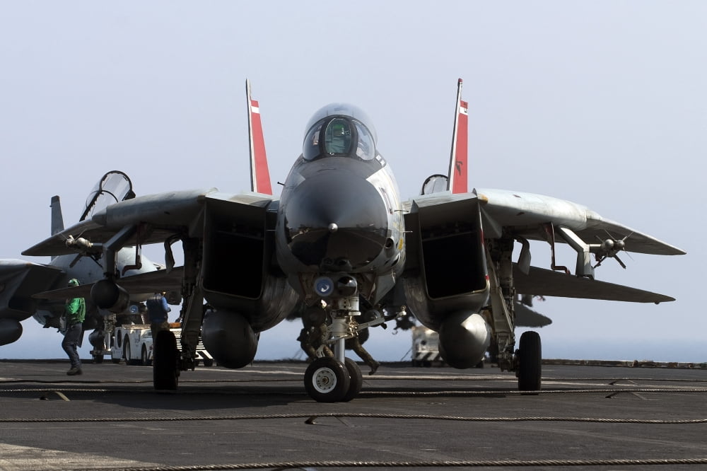 An F-14D Tomcat on the flight deck of USS Theodore Roosevelt Canvas Art - Gert KromhoutStocktrek Images (35 x 24)