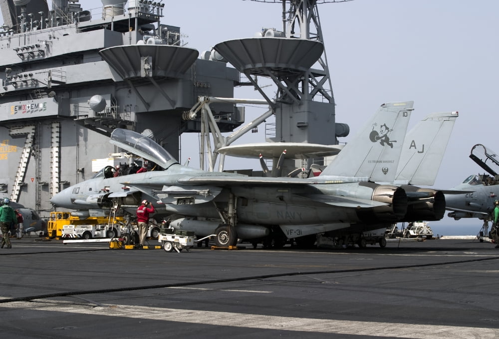 An F-14D Tomcat on the flight deck of USS Theodore Roosevelt Canvas Art - Gert KromhoutStocktrek Images (35 x 24)