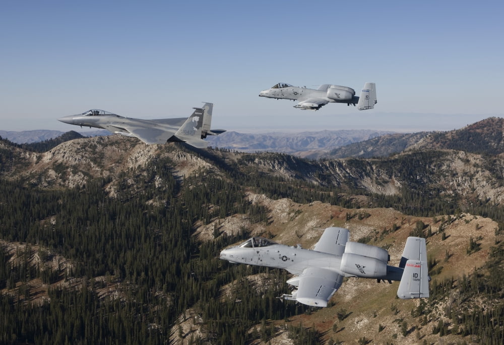 An F-15 Eagle and two A-10 Thunderbolts in flight over Central Idaho Canvas Art - HIGH-G ProductionsStocktrek Images (18 x 12)