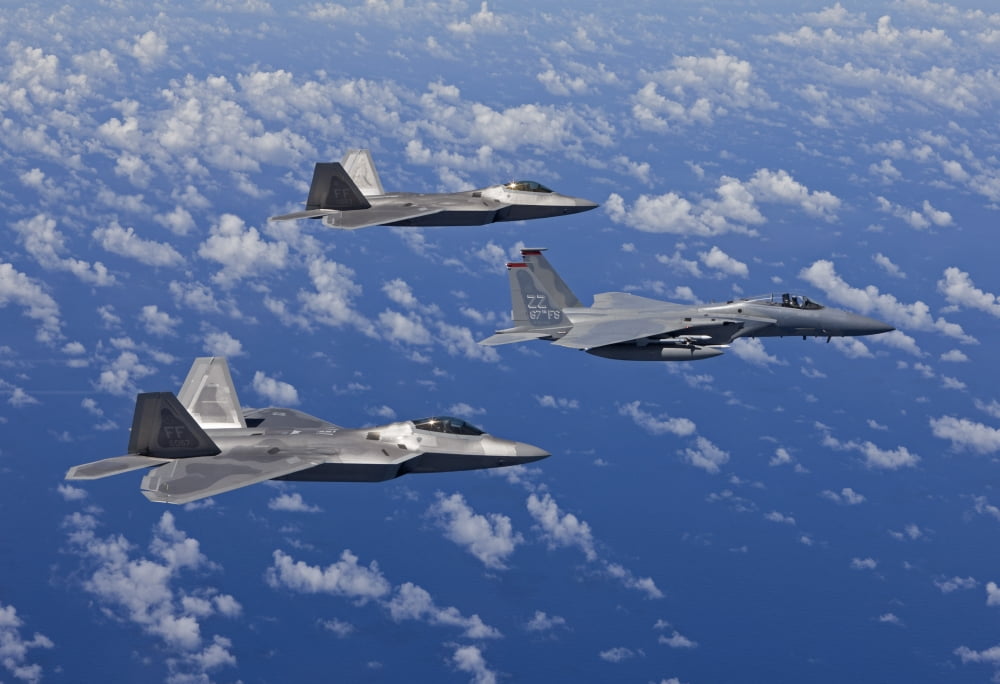 An F-15 Eagle and two F-22 Raptors fly in formation over Japan Canvas Art - HIGH-G ProductionsStocktrek Images (18 x 12)